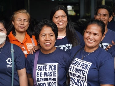 Philippine women smiling in a group photo