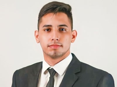 Portrait of a man with a plain background